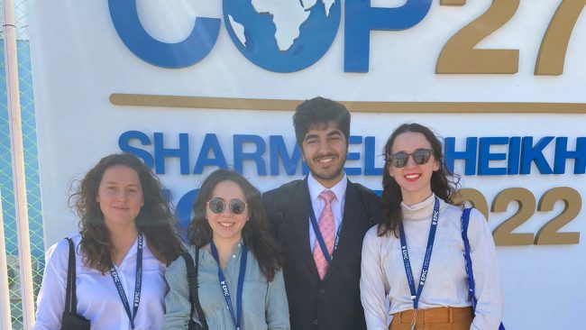 students pose for a picture at COP27