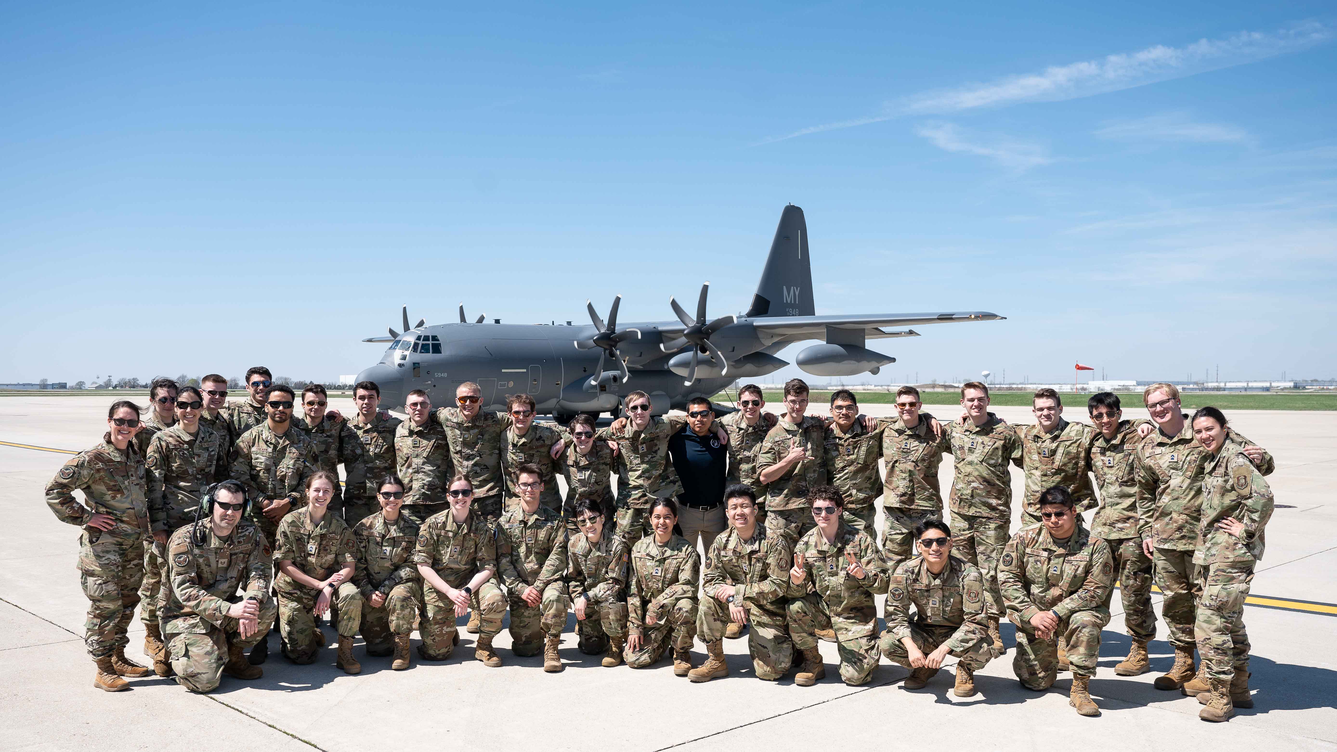 Cadets pose in front of HC-130J