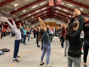 Students doing yoga poses