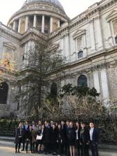 Group Photo of UChicago Students in Business Clothing