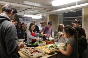 Students sharing a meal at Calvert House Undergraduate Dinner